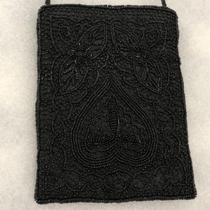 Beaded evening bag. Black